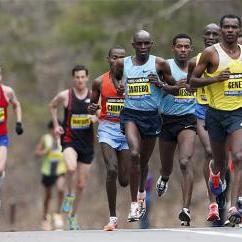 Elite mens marathoners including Levy Matebo, fourth from left, and Markos Geneti, front right, run in the 117th Boston Marathon